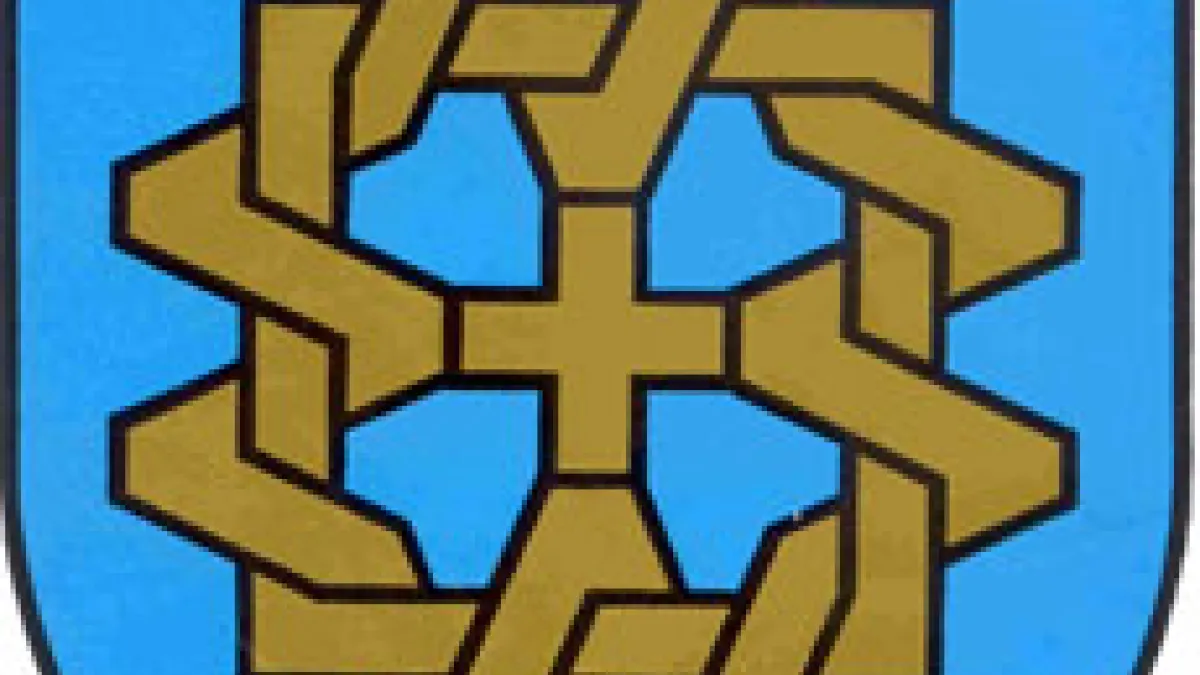Wappen der Stadt Willich. Vier ineinander verschachtelte 'Ws' umgeben das kurkölnische Kreuz
